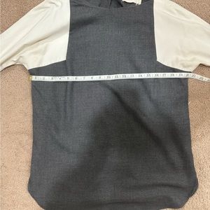 Unique top with buttons in the back